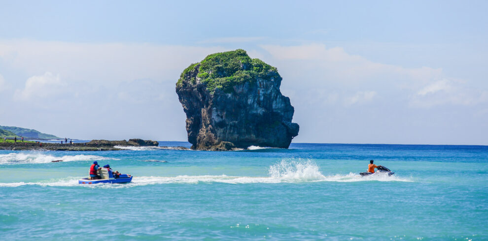 Chuanfan Rock Sail Rock and Water Sports by the Beach of Kenting Pingtung