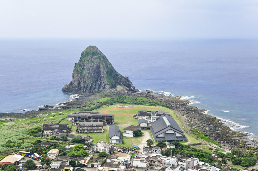 Panoramic View of the Peaceful Coastline and Village of Lanyu Orchid Island at Hilltop Taitung